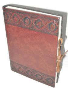 Lederboek bruin bewerkte rand schilden